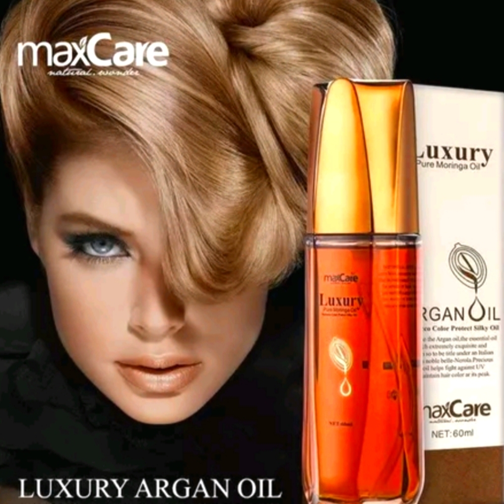 MOROCCAN ARGAN OIL ENRRICH WITH KERATIN PROVIDES NUTRITION.
